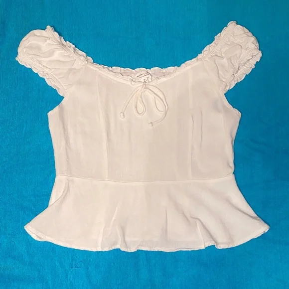 Women’s White Ruffle-Shoulder Peplum Blouse - Picture 1 of 3